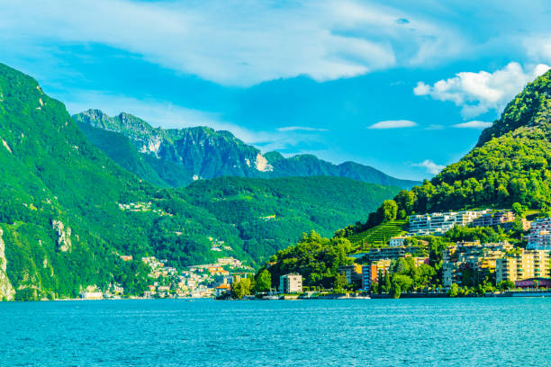 view of a small village situated on lugano lake, switzerland - ticino canton mountain lake lugano lake imagens e fotografias de stock