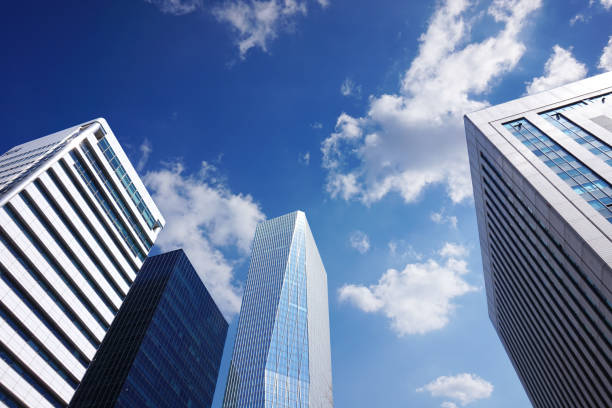 istock Company business building, blue sky 1138956042