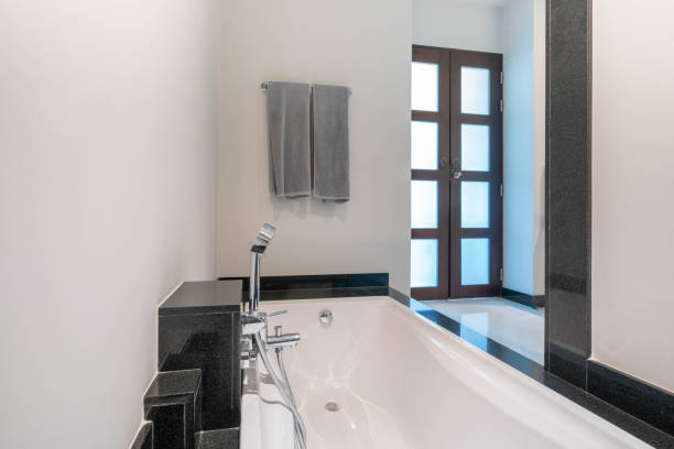 istock beautiful interior real white bathroom features bathtub 1138958587