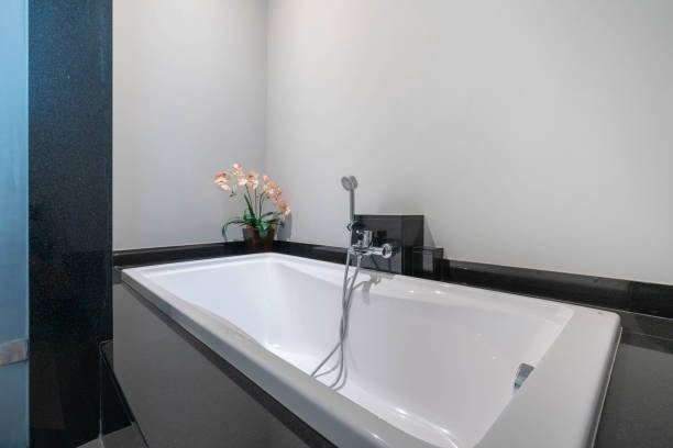 istock beautiful interior real white bathroom features bathtub 1138958589
