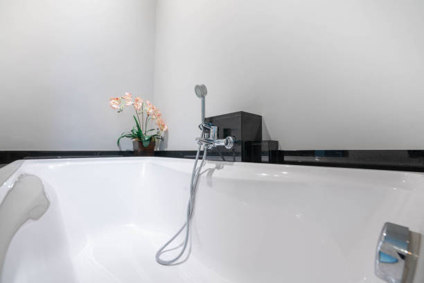 istock beautiful interior real white bathroom features bathtub 1138958595