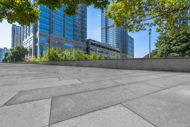 istock modern buildings and empty pavement in china. 1138961385