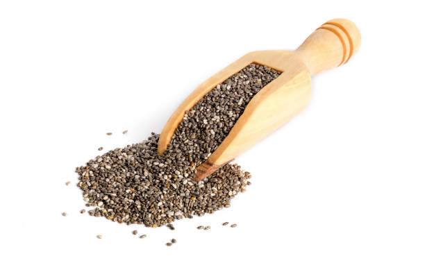 istock Chia seeds on wooden scoop 1138966662
