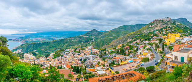 Aerial view of Castelmola village and Taormina town, Sicily, Italy