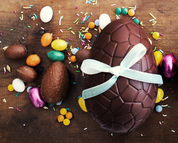 istock Chocolate Easter eggs on wooden background. Happy Easter!