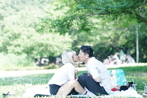 Happy couple is exercising in the park,Hyougo,Japan,Public park