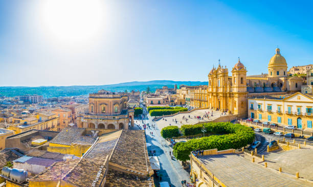 Aerial view of Noto including Basilica Minore di San Nicolò and Palazzo Ducezio, Sicily, Italy Aerial view of Noto including Basilica Minore di San Nicolò and Palazzo Ducezio, Sicily, Italy noto sicily stock pictures, royalty-free photos & images