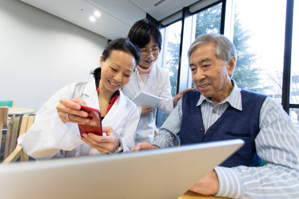 istock Female doctors and senior patient 1138984573