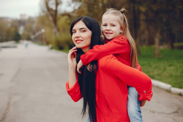 istock mother and daughter in a park 1138987407