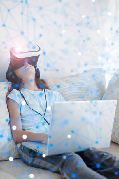 istock Girl having fun with VR headset 1138998305