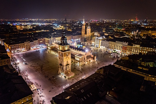 Aerial drone view on Cracow main square at night. Cracow, Lesser Poland province