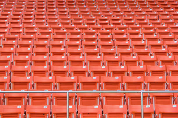 istock Folded green plastic chairs in a stadium 1138999805
