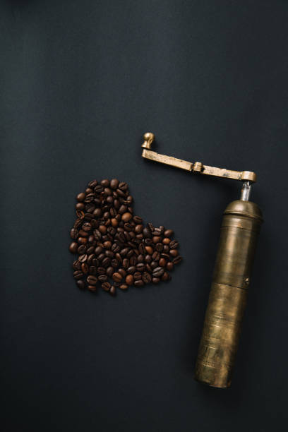 istock Old Turkish handheld mill and coffee beans 1139001632