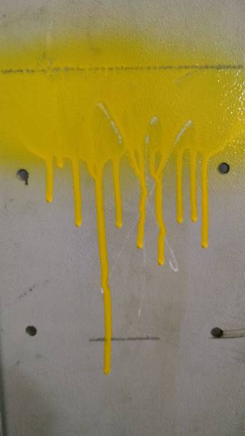 istock Stain yellow paint on a metal surface. Background, pattern, texture. Close-up. 1139006392