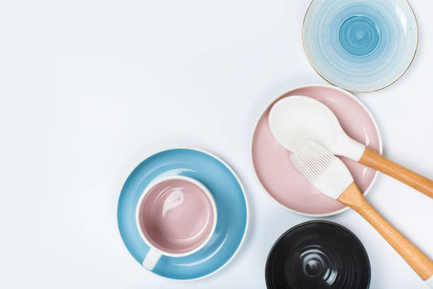 istock kitchen utensils, Clean  porcelain dishes on white  background 1139006403