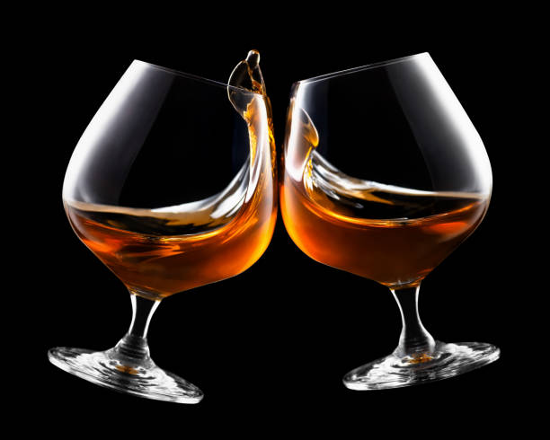 istock glasses of brandy making toast 1139008753