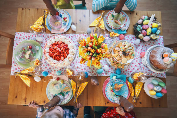 istock Cute Little Kids Having Fun on a Decorated Easter Table 1139012730