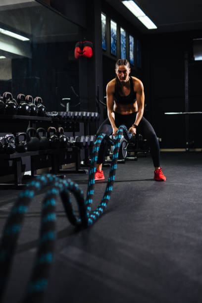 istock Battle ropes session at the gym 1139012984