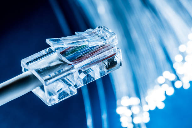 istock Network cables and bundle of optical fibers with lights in the ends. 1139015524