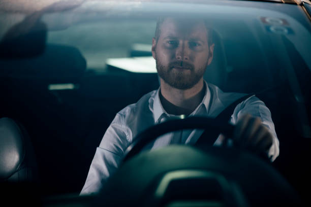 istock Businessman driving car 1139022458