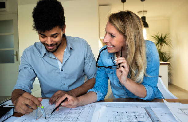 istock Office coworkers in business meeting discussing project plans 1139022468
