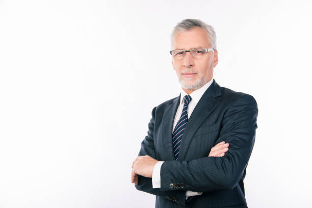 istock confident intelligent  business expert with gray beard and glasses crossing hands 1139031877
