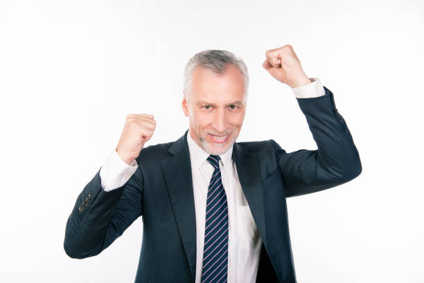 istock old confident businessman celebrating his success 1139033139