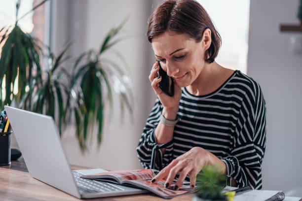 istock Woman talking on the phone and ordering cosmetics 1139035072