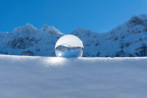 istock Winter mountains in a crystal ball 1139037348