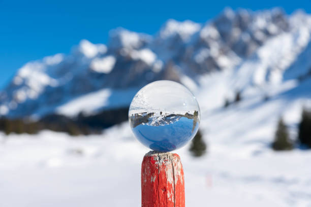 istock Winter mountains in a crystal ball 1139037357