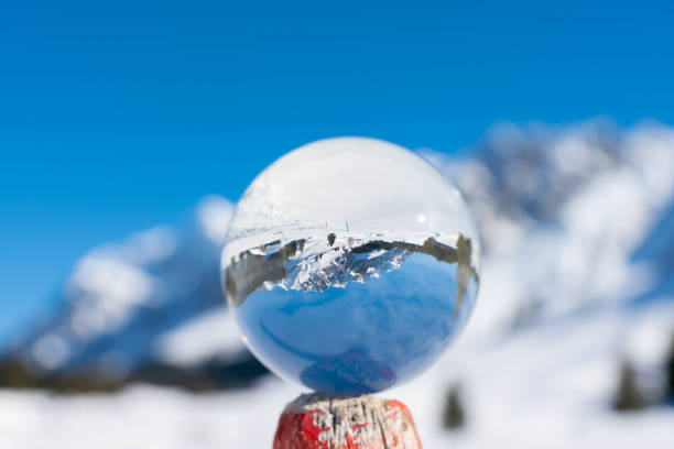istock Winter mountains in a crystal ball 1139037366