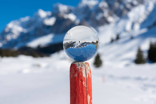 istock Winter mountains in a crystal ball 1139037372