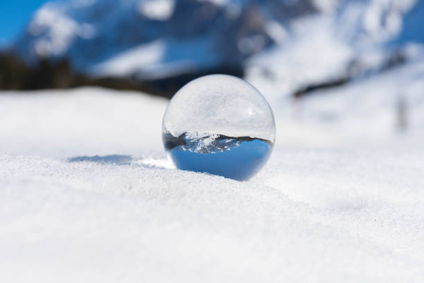 istock Winter mountains in a crystal ball 1139037374