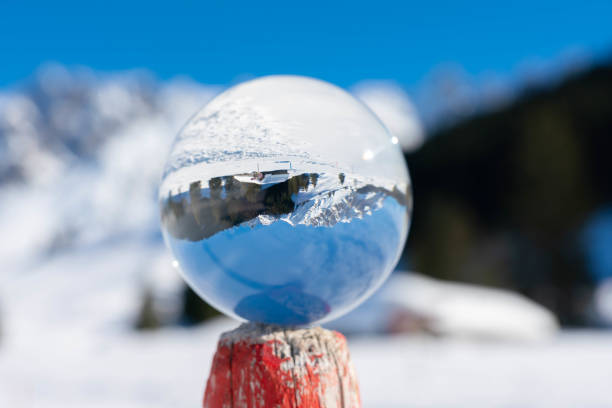 istock Winter mountains in a crystal ball 1139037378