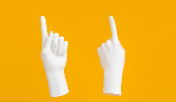 istock One finger Pointing up white hand gesture on yellow background. 1139038557