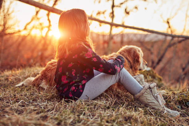 istock Two friends enjoying sunset / sunrise time in nature. 1139040292