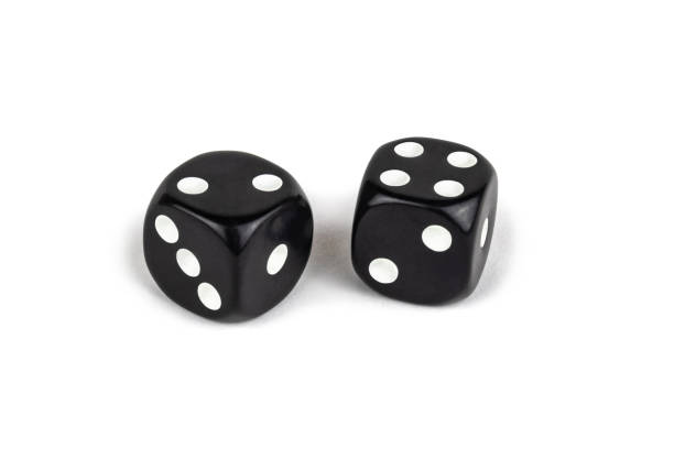 Two black dice isolated on a white background. Two and four.