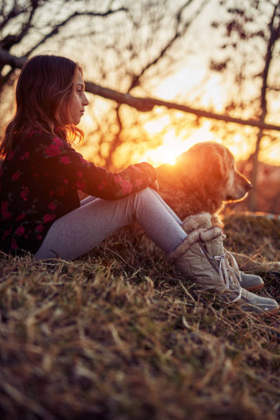 istock Two friends enjoying sunset / sunrise time in nature. 1139040435