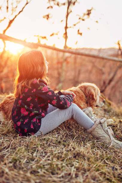istock Two friends enjoying sunset / sunrise time in nature. 1139040547
