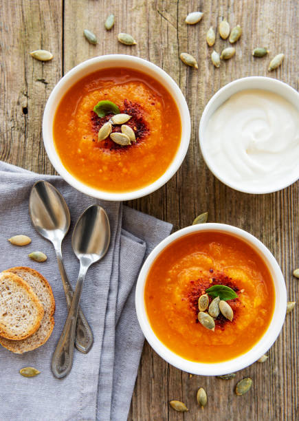 istock Bowls of pumpkin soup 1139041032