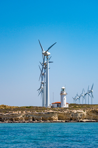 Rocky seashore and Windmills