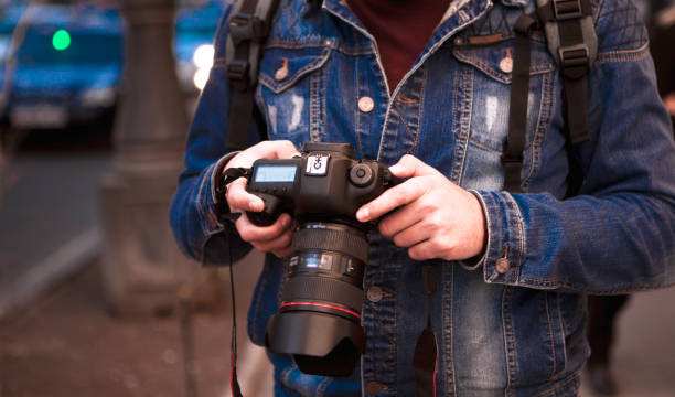 istock camera and photographer 1139045212