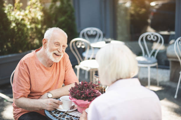 istock Delighted old man having date with woman 1139049324