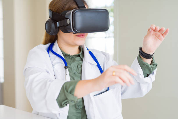 istock Doctor woman doing surgery simulation using virtual reality glasses 1139053725