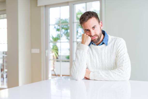 istock Handsome man wearing casual sweater thinking looking tired and bored with depression problems with crossed arms. 1139055066