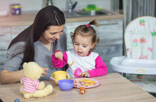 istock Breakfast with baby daughter 1139059401