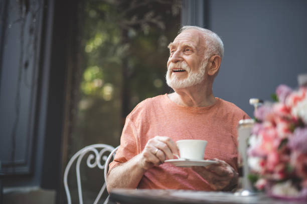 istock Cheerful senior man waiting for spouse in cafe 1139063739