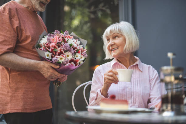 istock Amazed mature lady meeting spouse outside 1139063744