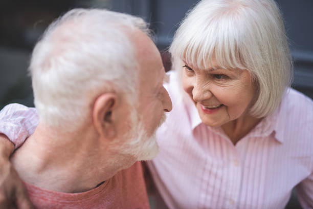 istock Happy mature couple hugging outside 1139063748