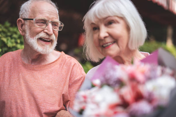 istock Happy elderly couple on date outside 1139063785
